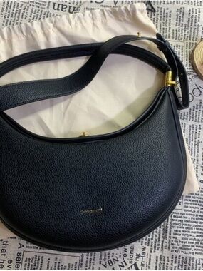 Longchamp Black Pebbled Crescent Shoulder Bag with Gold Hardware